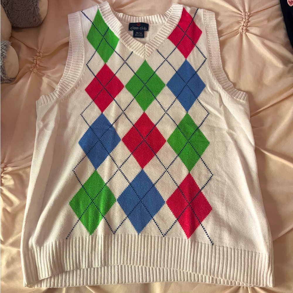 White sweater vest.